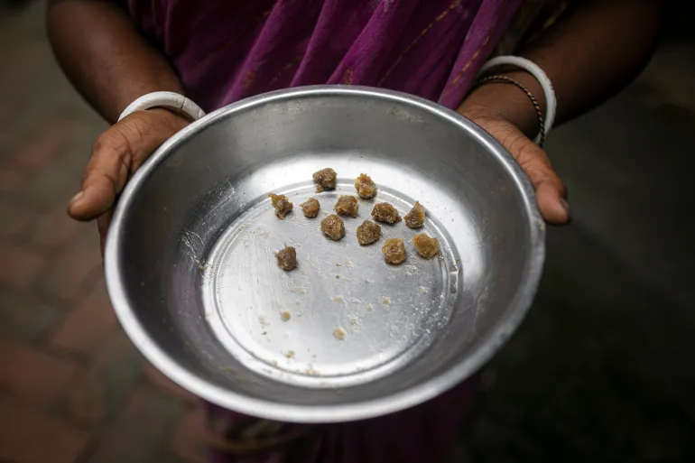 Deepa-Mandol-shows-medicine-that-she-feeding-her-husband-1789127258