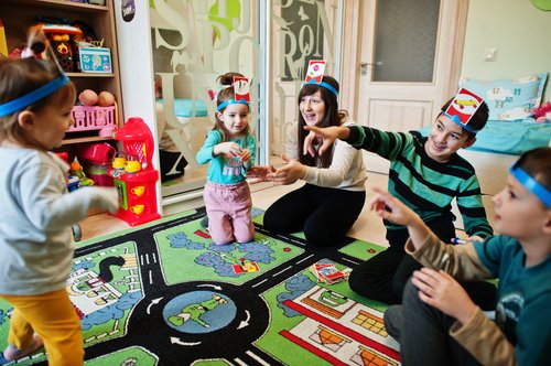 family-game-time-together-in-a-playroom-2026-01-07-23-52-42-utc