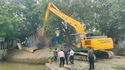 মুন্সিগঞ্জে ধলেশ্বরী তীরের অবৈধ স্থাপনা উচ্ছেদ