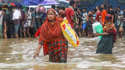 বন্যায় উদ্ধার কাজ ও ত্রাণ বিতরণ